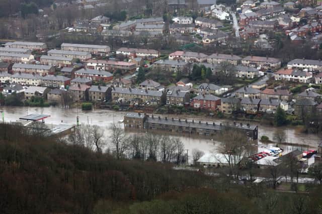 Mytholmroyd centre under water after the River Calder burst its banks.