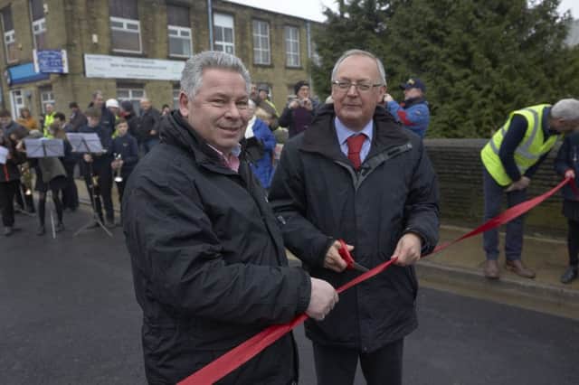 Elland Bridge opens. Coun Tim Swift cuts the ribbon.