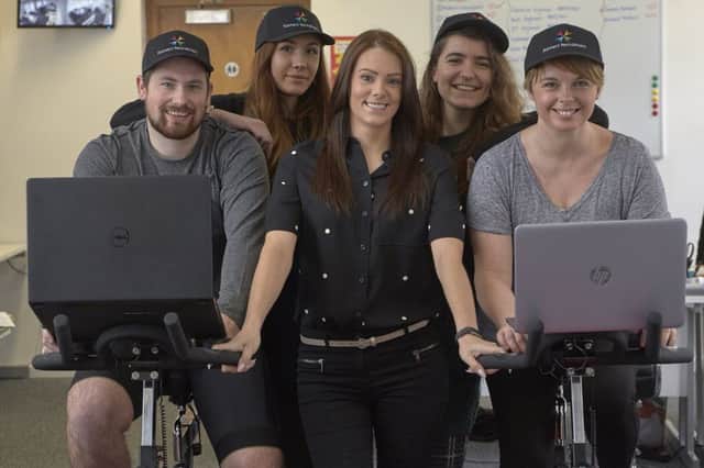Connect Recruitment staff are cycling a total of 1,000 miles on exercise bikes to raise money for Comic Relief. Matt Robinson, Maisie Roper, Jenny Boguslawski, Bex Greenwood and Emma Davison.