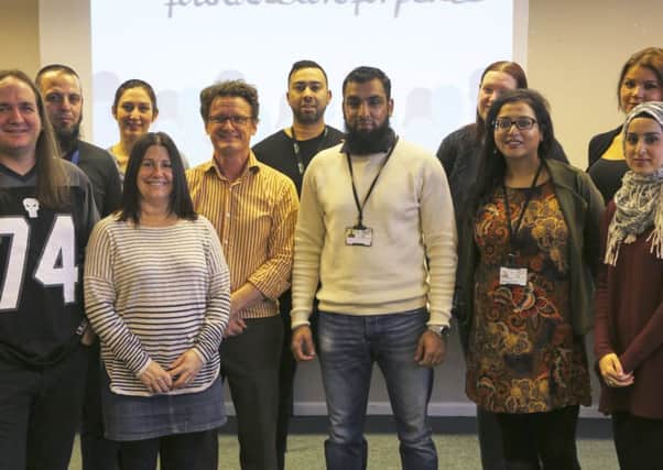 Sadia Hussain (Front, second in from the right) delivering a talk as part of the PREVENT anti-terrorism programme at Three Ways, Ovenden.