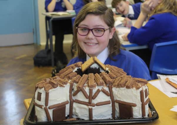 Charlotte Priestley made a Globe cake for her English homework