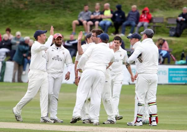 Actions from the Parish Cup Final, Jer Lane v Booth at Blackley.
Booth celebrate a wicket.