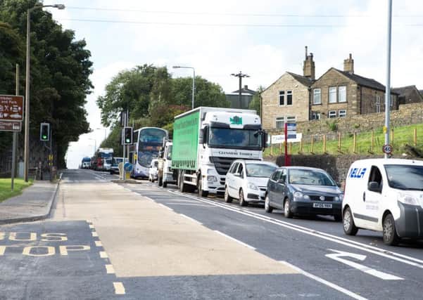 Road works on the A58, at Stump Cross, causing 30-40 minute delays for traffic
