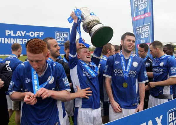 Halifax celebrate play-off victory at Brackley.