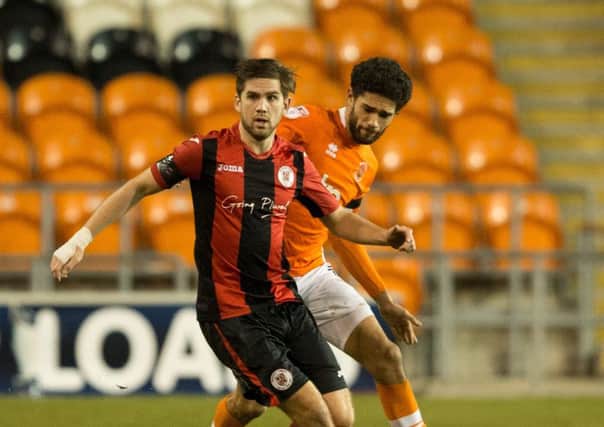 James Armson of Brackley Town on the ball

at Blackpool in the FA Cup in December.