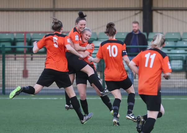 DANNI BROWN CELEBRATES WITH LAUREN DOYLE AFTER OPENING THE SCORING