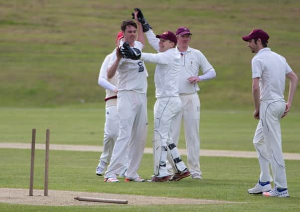 Actions from Brighouse v Hartshead Moor, cricket, at Brighouse Sports Club. Pictured is Ian Wardlaw celebrating second wicket