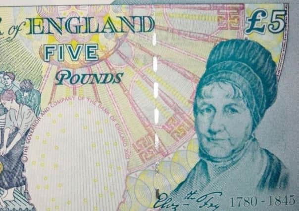 The old five pound notes will soon be out of circulation.