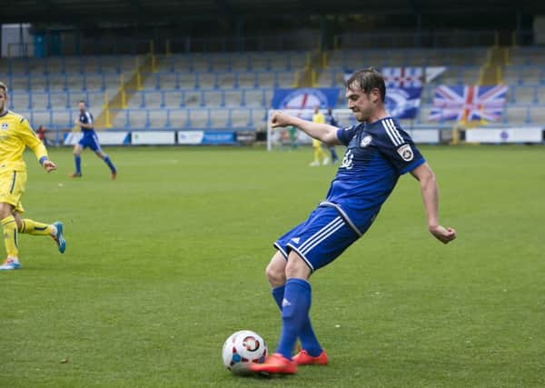 Sam Walker in action for Halifax at home to Guiseley
