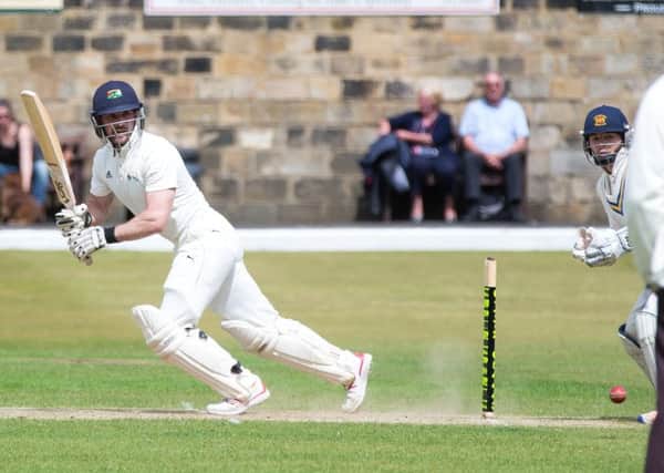 Actions from Todmorden v Lowerhouse, at Todmorden CC. Pictured is Elliott Gilford