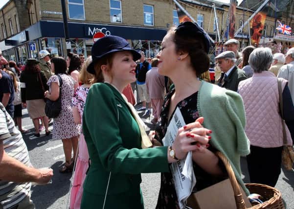 Brighouse 1940's Weekend. Madeline and Claire Smith dancing in the street.