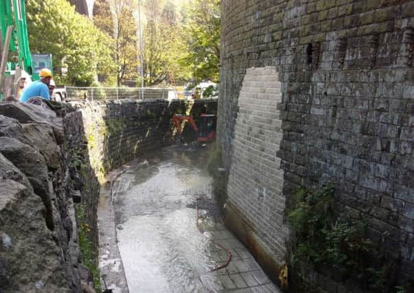 Work is now complete on three schemes to repair flood damaged roads and structures in Calderdale. Pictured are the wall repairs at Robinwood, Todmorden