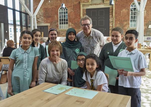 Penelope Wilton and Geroge Costigan with poets from Beech Hill School at Halifax Square Chapel Arts Centre