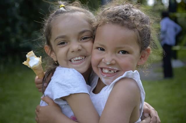 Keeping cool in thr recent hot weather are new friends Maria Elznic aged four and Nyla Swarray aged three.