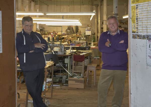 The Last Factory: Richard Pickles with cutter Trevor Snell at Shorties, with the new outlet - The Last Factory - selling direct to the public for the first time; its website is expected to be up and running in just a few weeks. Picture: Charles Round