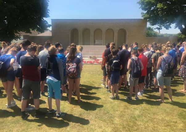 Lightcliffe Academy students pictured paying their respects at the British military cemetery