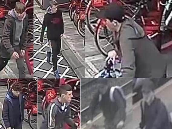 CCTV images of men the British Transport Police would like to speak to in connection to thefts at Todmorden station
