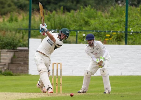 Actions from Southowram v Bridgeholme, at Southowram CC. Pictured is Oliver Challis