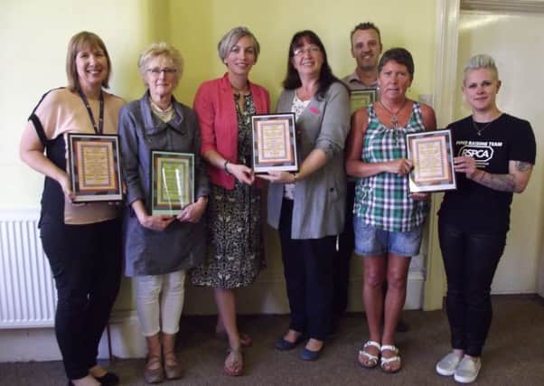 The top six shops receiving their certificates from BBI Chair, Anne Colley