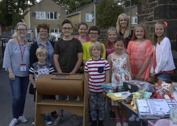Seaside fun: The themed fair opened by Lizzie Jones raised enough money to buy a defibrillator