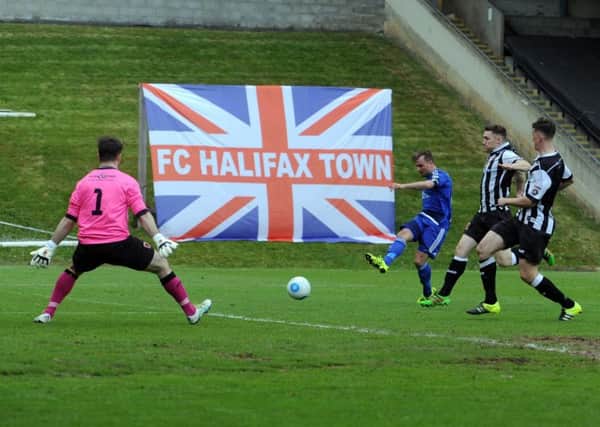 13 May 2017.......    Halifax Town v Choley National Conference North Play-off Final at the MSI stadium Halifax. 
Captain Kevin Roberts scores Towns first goal. Picture Tony Johnson.