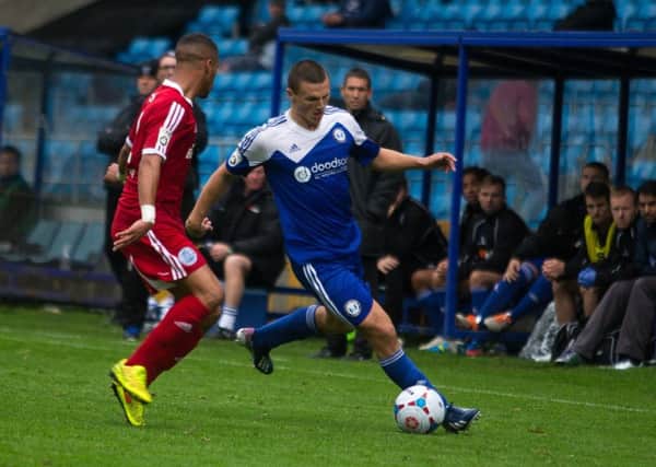 Matty Pearson in action for Halifax at home to Aldershot in September 2014.