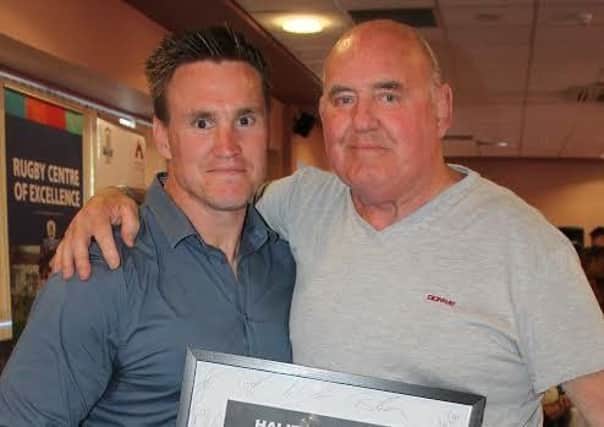 Players Association Chairman Ken Roberts, Heritage Number 732, with current coach Richard Marshall, Heritage Number 1077
