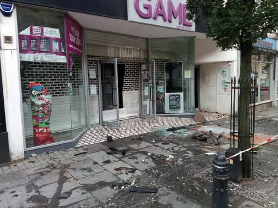 Damage outside the Game store in Southgate, Halifax, following a fire