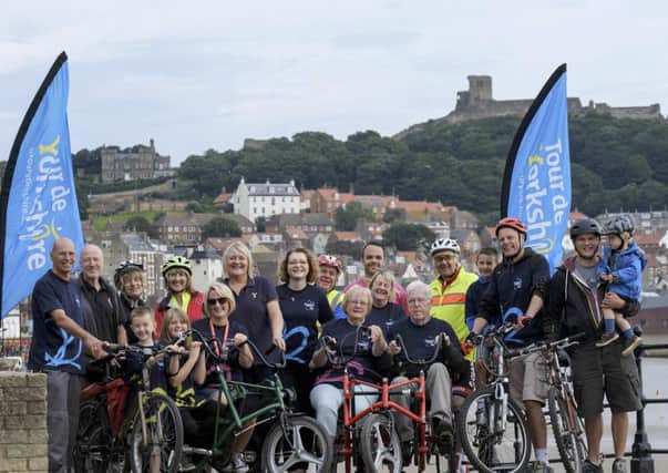 Â© Tony Bartholomew/07802 400651 /mail@bartpics.co.uk                                                     11th August 2017                                                        PICTURE SUPPLIED TO WELCOME TO YORKSHIRE FOR USE IN PRESS RELEASE               Members of Scarborough and Ryedale Community cycling group and representatives from Welcome to Yorkshire who helped raise money for Alzheimer's Society during the Tour de Yorkshire as part of the Final Mile fundraising team photographed at the south Bay,Scarborough