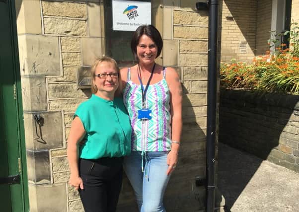 Rachel Dilley, Practice Manager of Town Hall Dental, with Alison Mitchell, Chief Executive of BASH Local