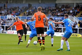 Danny Rowe became Fylde's all-time record goalscorer with number 120 in all competitions as he netted a late second goal in a victory over struggling Hartlepool at Victoria Park