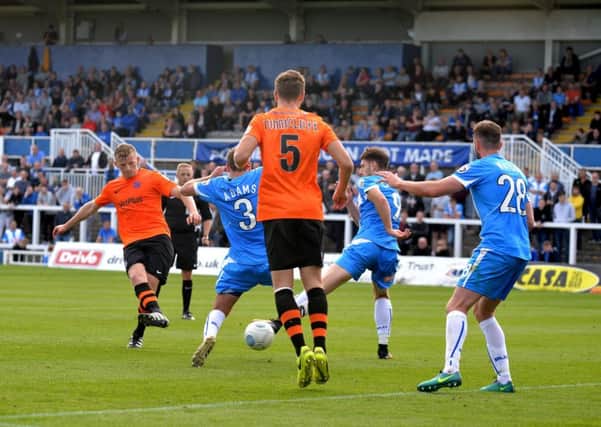 Danny Rowe became Fylde's all-time record goalscorer with number 120 in all competitions as he netted a late second goal in a victory over struggling Hartlepool at Victoria Park