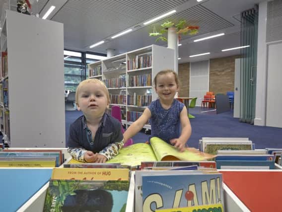 Halifax Library opens.Hester and Wilfred Grace, aged three and 16 months the first into the childrens library