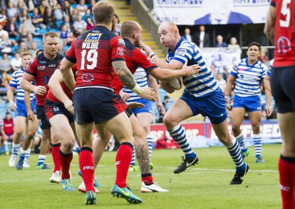 Fax's Shane Grady takes on the Featherstone defence