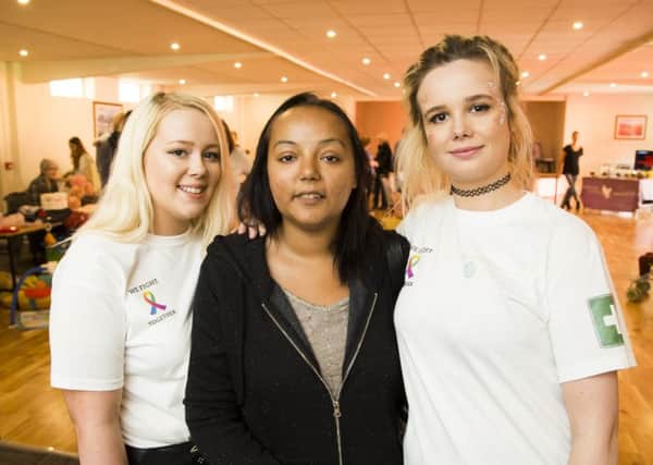 Together: Stephanie, centre, with her sisters Chloe Taylor, left, and Jade Glover, right