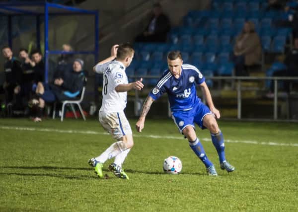 Shaun Tuton in action for Town against Tranmere at The Shay in December 2015, when the two teams drew 1-1.