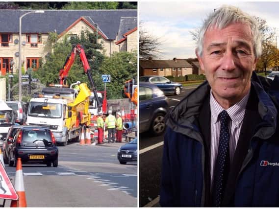 Calderdale Council has backed plans to charge utility companies for overrunning roadworks