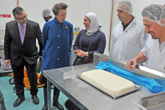 HRH The Princess Royal visiting Syrian refugee Razan Alsous at Dama Cheese