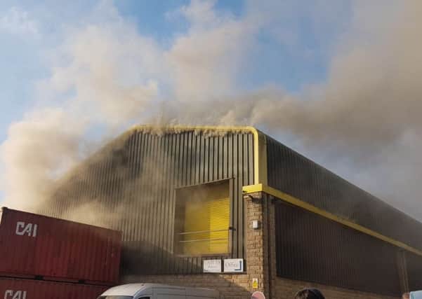 Smoke billows out of Drew Forsyth, furniture makers, at Moderna Industrial Estate, Mytholmroyd. Picture courtesy of the company.