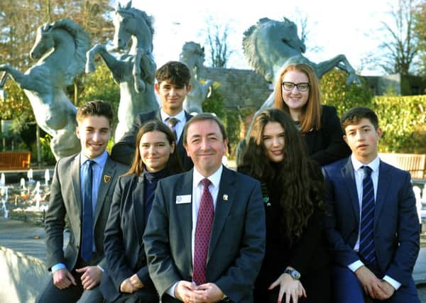 241117  Pupils from Queen Ethelburghas School,  near York,  with the headmaster Steve Jandrell as it was awarded the top independent school in the North. Picture Gary Longbottom.