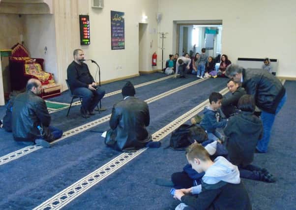 The group visited a mosque and heard about Islam