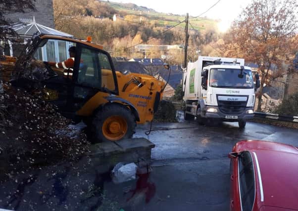 The lorry about to be towed away from the icy Danny Lane, Luddenden Foot. Picture courtesy of @Calder_roads1