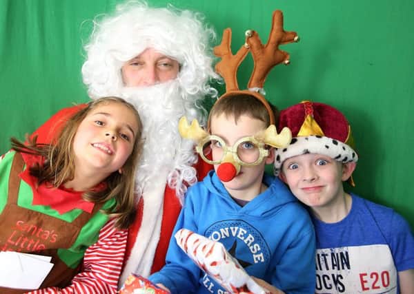 A previous Elland Christmas Fair at Berties at La Cachette.
Pippa Elf and Father Christmas with brothers Ethan Carrington, nine, left, and Caelen Carrington, seven.