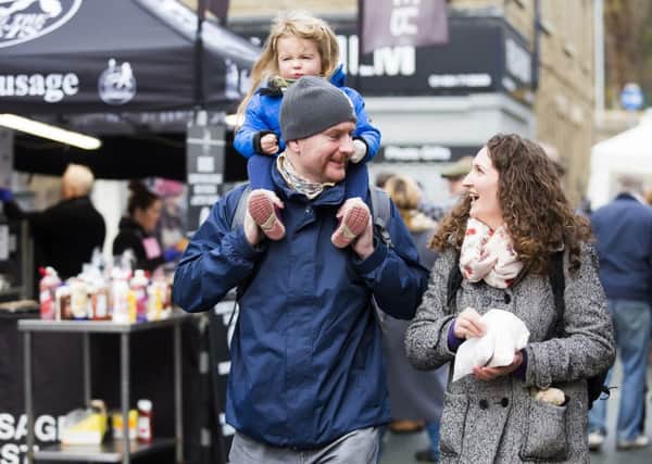 Brighouse Chrismas Market. Dominic Carroll, Iona Carroll, three, and Steph Bishop.