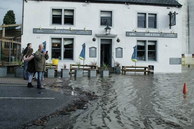 Remember: Mark Minass picture of flooded Brighouse