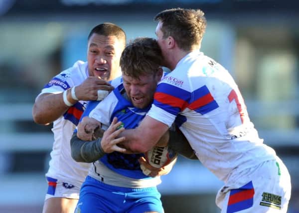 Ben Kaye is halted by the Wakefield defence. Picture Tony Johnson.