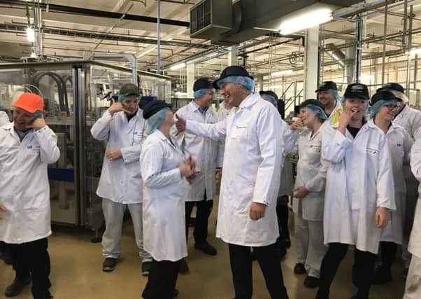 They call it Blue Monday - but staff at a Halifax factory have had some lessons in laughter that will blow the blues away