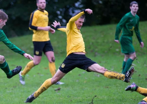 Actions from Sowerby United v Midgley United, at Ryburn Valley High. Pictured is George Bamford