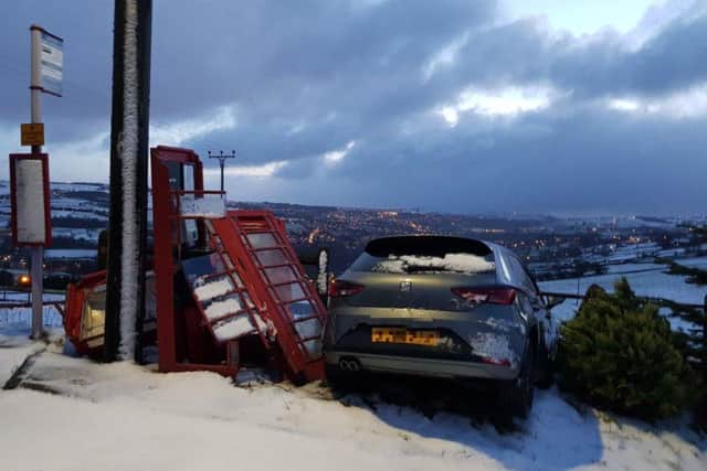 A car loses control in snowy Sowerby.