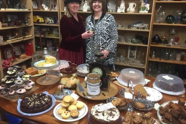 Trish with Sandra Binns, one of the antiques dealers, at the opening of the temporary premises after the Boxing Day 2015 floods